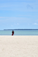 Masai man on a beach, Kendwa, Zanzibar, Tanzania, Africa