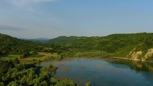 Lake Butoniga water dam in Croatia Istria peninsula closing in lower altitude, Aerial drone approach shot