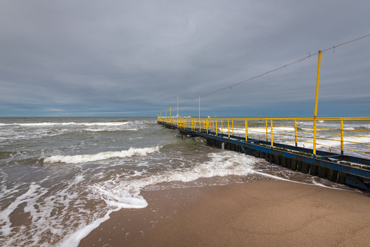 Baltic sea on a cloudy autumn day. Jaroslawiec, a fishing village in Poland