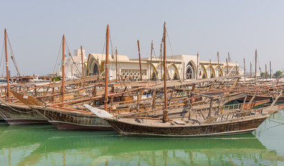 Doha, Qatar - located at the Eastern side of the Corniche, the Dhow Harbour is one of the main landmarks of Doha, and show a full display of traditional boats and vessels