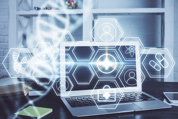 Desktop computer background and DNA drawing. Double exposure. Science concept.