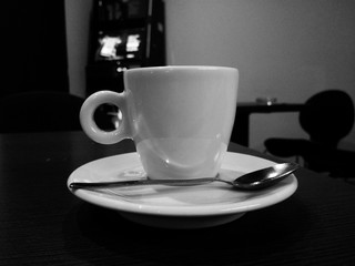 cup of coffee on wooden table