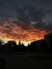 Nice sunset with clouds, in orange and purple shades