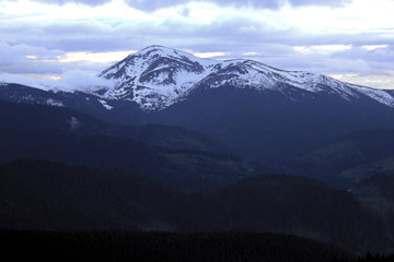 Ukrainian mountains. Spring clouds low mountains