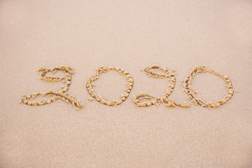 2020 writing in the sand  beach in the morning, appropriate the Backdrop idea copy space