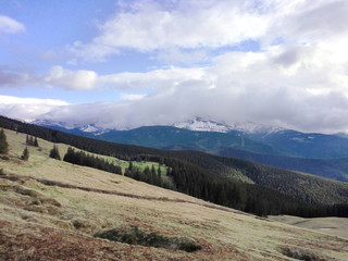 Ukrainian mountains. Spring clouds low mountains