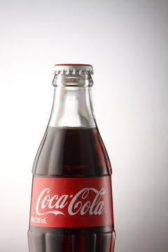 KUALA LUMPUR, MALAYSIA - june 6TH, 2015. A bottle of Coca Cola soft drinks. Coca Cola drinks are produced and manufactured by The Coca-Cola Company, an American multinational beverage corporation