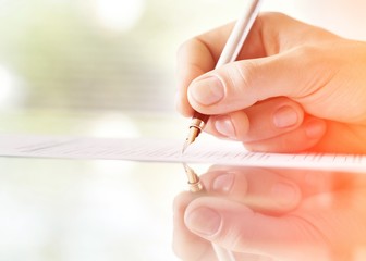 Businessman is signing a contract, business contract details