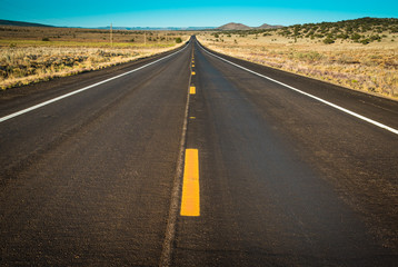 Wide angle desert American road trip background. Route 66, Arizona, USA.