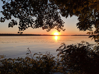 Fototapeta na wymiar Beautiful sunset on the river