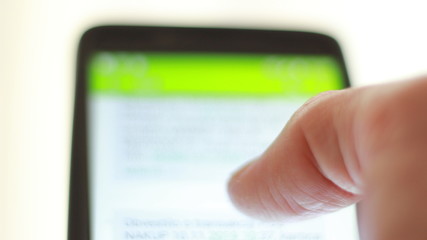 Sliding on mobile phone with one finger, searching documents, files, data.