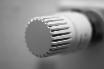 White radiator valve close up.