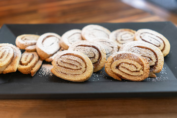 Homemade cinnamon roll cookies on a plate