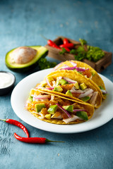 Homemade chicken taco with avocado
