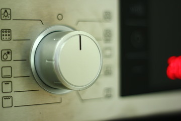 Big plastic button for operating with a device.