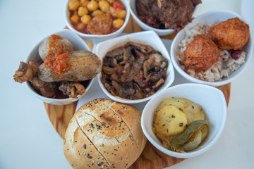 Selection of fine spanish tapas delicious fine food spain tapa bread meat garbanzos rice meat balls chicken potao