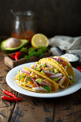 Homemade chicken taco with avocado
