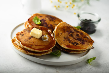 Homemade blueberry pancakes with butter