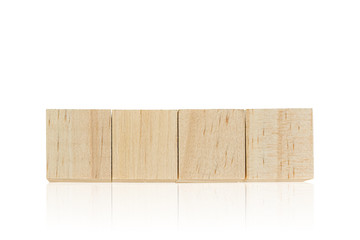 Wood toy cubes isolated on white background.