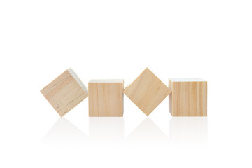 Wood toy cubes isolated on white background.