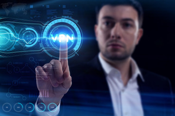 Business, Technology, Internet and network concept. Young businessman working on a virtual screen of the future and sees the inscription: VPN