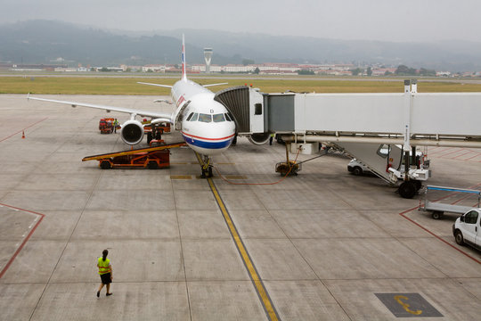 Valladolid, Castilla y Le&oacute;n / Spain: August 7, 2009: Air France plane preparing before taking off at Valladolid Airport, with cloudy and stormy sky.