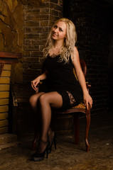 Naklejka premium Cute blonde woman in gorgeous dress