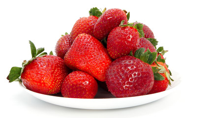 Large, ripe strawberries. Isolated. Juicy dessert, healthy vegetarian food. Bright, colorful breakfast. Strawberries on a white plate, isolated background. Organic, natural food.