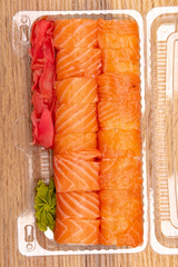 Japanese sushi in a plastic container
