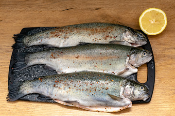 Rainbow trout on a board