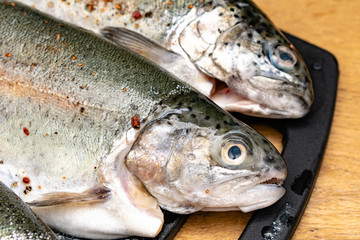 Rainbow trout on a board