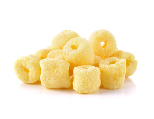Crunchy corn snacks milk flavour on white background