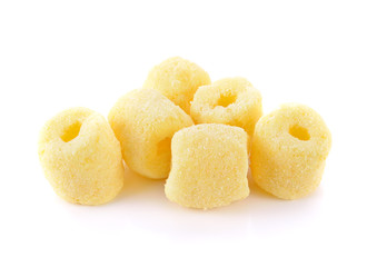 Crunchy corn snacks milk flavour on white background
