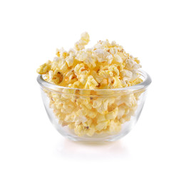 Popcorn in glass bowl on the white background