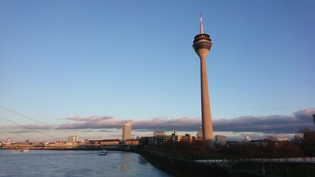 Timelapse of telecommunications tower with dark clouds moving forward.