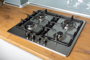 Modern gas stove with stainless steel and pan