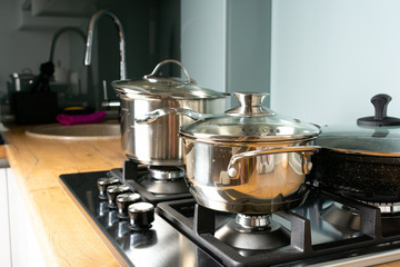 Modern gas stove with stainless steel and pan