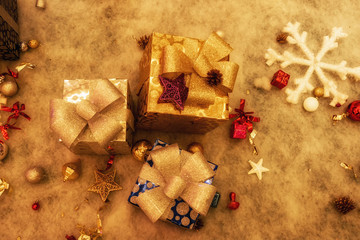 A gift box used to decorate a Christmas scene.