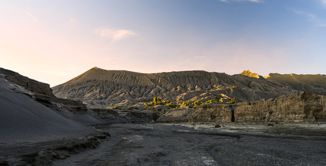 (Selective focus) Stunning view of the Mount Bromo crater illuminated during a beautiful sunrise. Mount Bromo is an active volcano in East Java, Indonesia.
