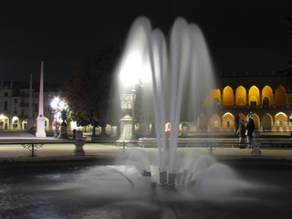 Padova, Italy - October 12th, 2019: Prato della Valle, in Padova, at night. The biggest square in Italy and one of the biggest in Europe, surrounded by a canal of water and by two rings of statues.