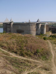 Fototapeta na wymiar Khotyn fortress on the right bank of the Dniester River in western Ukraine. Main gate of Khotyn fortress.
