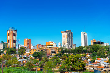 Fototapeta na wymiar Skyscrapers and city buildings, Asuncion, Paraguay. City landscape. Copy space for text.