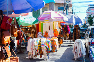 Sale of clothing and souvenirs in the local market, Asuncion, Paraguay.