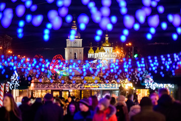 Festive Christmas illuminations and Saint Michael Golden Domed Cathedral in Kyiv, Ukraine. December 2019
