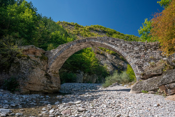 Fototapeta na wymiar Old bridge on Borovitsa river