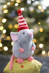 Little mouse toy, symbol of 2020. new year decoration. New Year 2020 Symbol. Greeting Christmas card.  Selective focus.