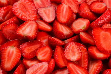 Strawberry slices. Fresh berries macro. Fruit background. Top view.