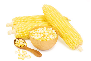 Sweet corn and seeds in wooden bowl with brown wooden spoon isolated on white background