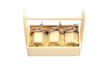 A jar of honey in a wooden box, a gift.