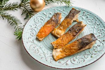 Fried carp fish slices. Traditional Polish Christmas eve dish.